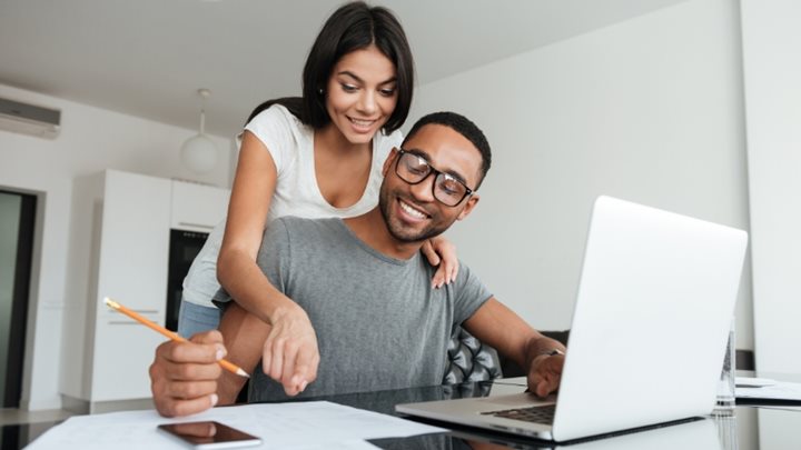 A couple researching the pros and cons of a HELOC vs. a cash out refinance.