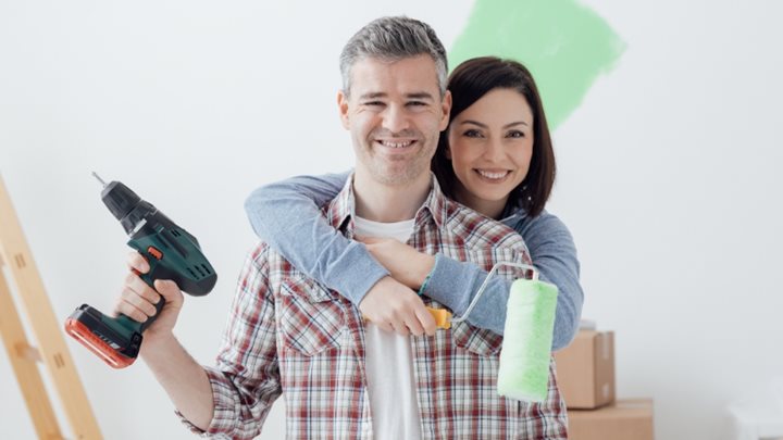A couple renovating their home after accessing their home equity.