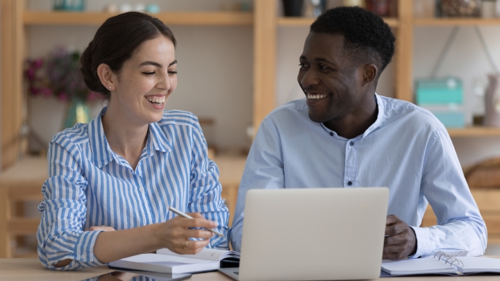 A couple comparing a HELOC and a cash out refinance to determine what’s best for their goals.